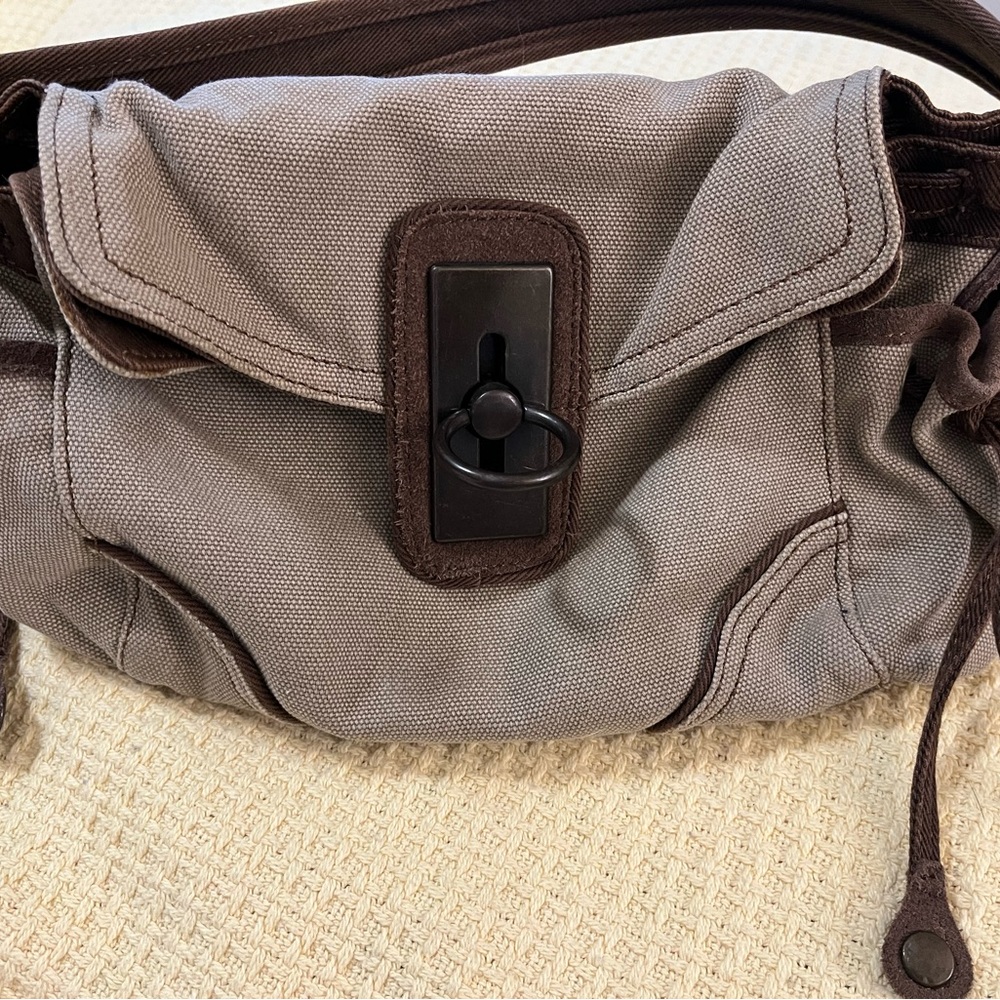 Gap Jeans 1969 brand cotton canvas and leather slouchy bag. Snaps for adjustment